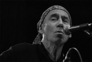 BW closeup of Jim, singing, black and white.